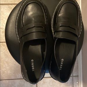 Black platform loafers